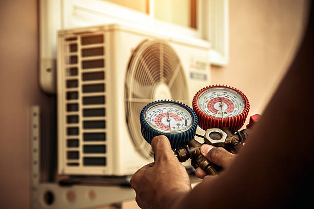 Professional Air Conditioning Service technician working in Reidville, SC